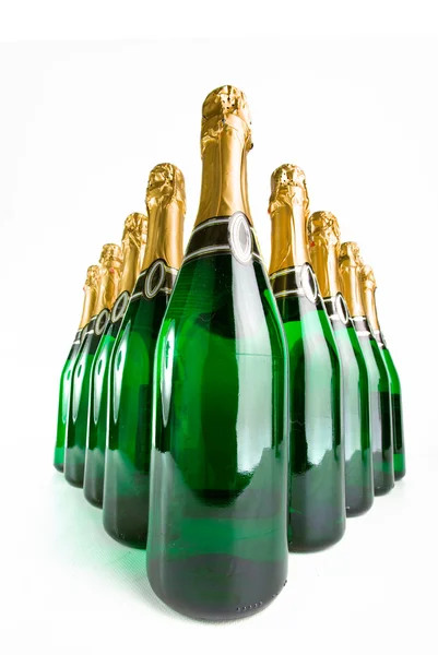 stock image Sparkling wine bottles on a white background