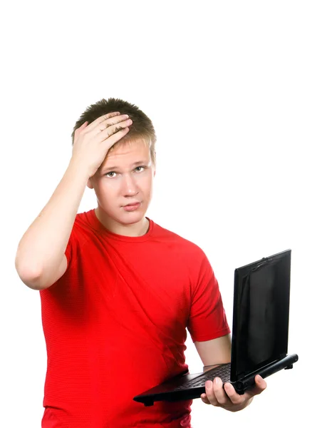 A tinédzser-val a laptop. fáradt a problémák. — Stock Fotó