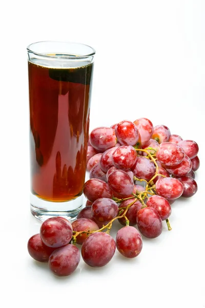 Grappolo d'uva e succo in vetro — Foto Stock