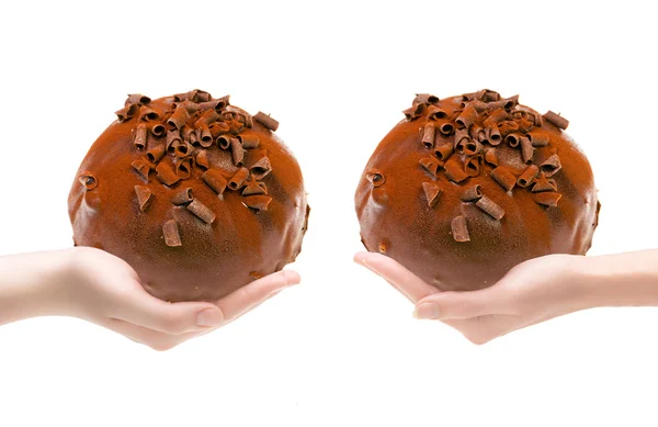 stock image Two hands with a chocolate pie are stretched towards