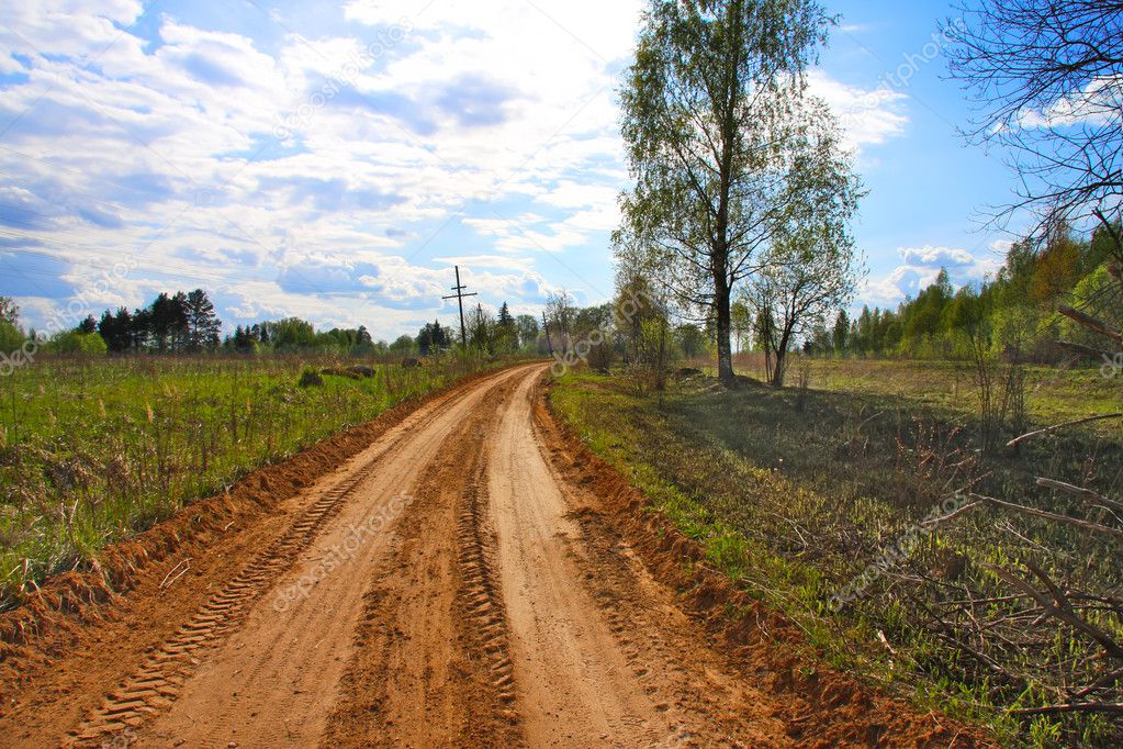 Rural dirt road, summer.