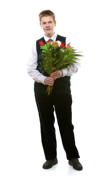 The pupil of the senior classes in a school uniform with a bouquet — Stock Photo, Image