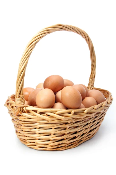 stock image Eggs in basket on white background