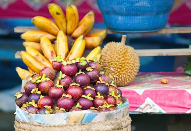 Tropical fruit in the market clipart