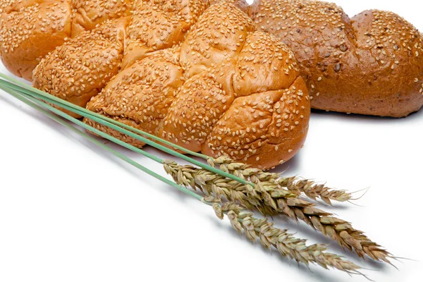 stock image Wheat and bread on white background