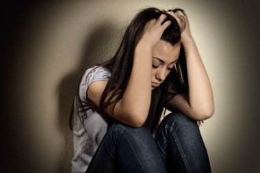 Closeup portrait of depressed teenager girl. clipart