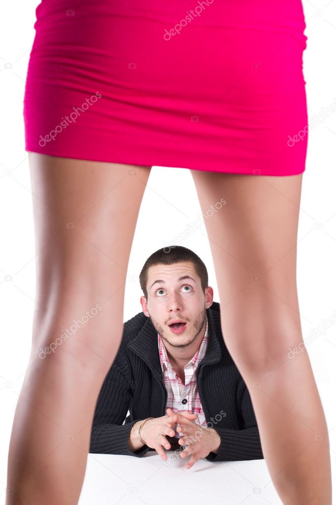 Surprised man looks at an attractive girl