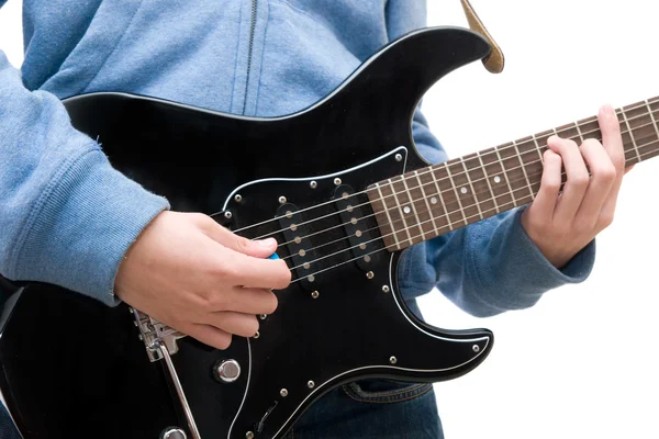 Tinédzser játszik elektromos gitár-fehér háttér — Stock Fotó