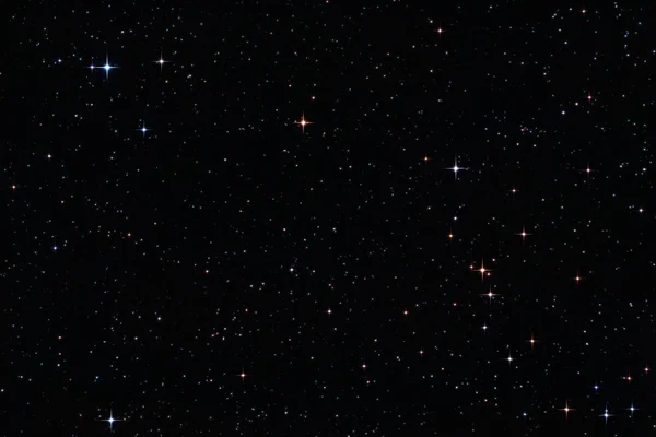 Estrelas coloridas no céu noturno — Fotografia de Stock