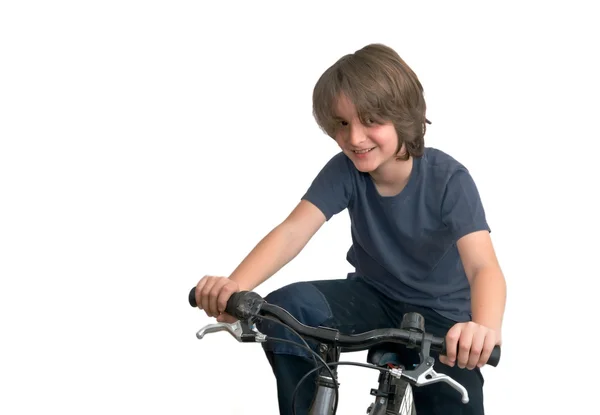 Criança em uma bicicleta — Fotografia de Stock