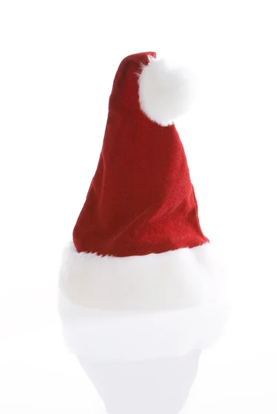 Santa Claus červený klobouk na bílém pozadí. — Stock fotografie