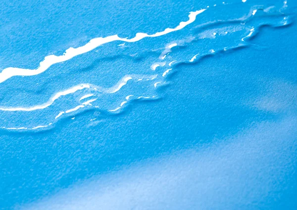 Fundo azul abstrato. Água sobre papel . — Fotografia de Stock