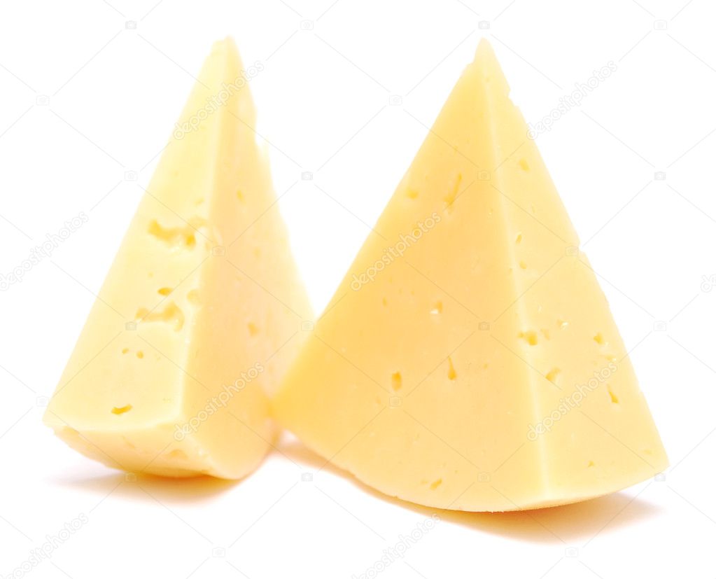 Pieces of cheese isolated on white