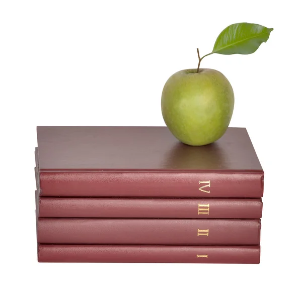 Πράσινο Μήλο Στο Σωρό Των Βιβλίων Άσπρο Φόντο — Φωτογραφία Αρχείου