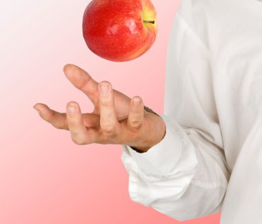 Apple falling to hand clipart