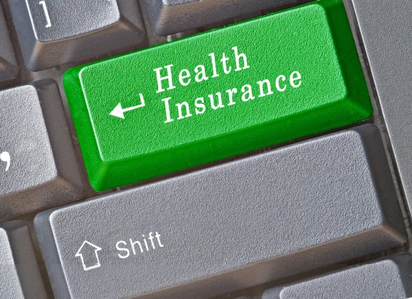 健康保険のためのキーボード — ストック写真
