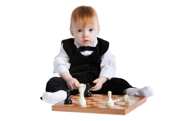 Petit garçon avec des échecs — Photo