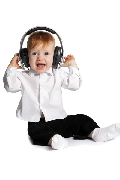 Malý chlapec s sluchátka — Stock fotografie