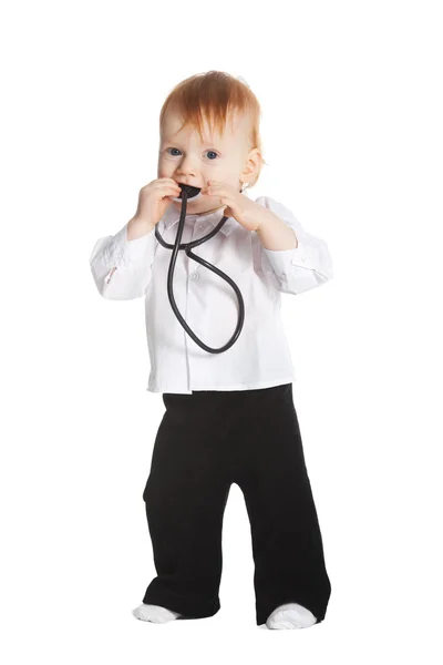 Little boy with stethoscope in mouth — Stock Photo, Image
