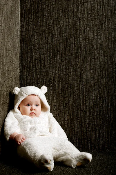 Little baby in white bear costume — Stock Photo, Image