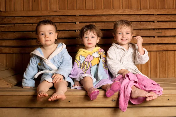 Tři legrační děti v sauně — Stock fotografie