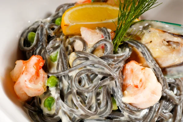 stock image Seafood black spaghetti