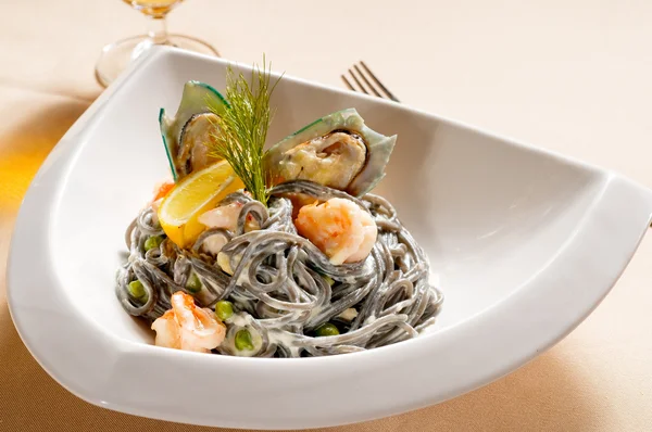 stock image Seafood black spaghetti