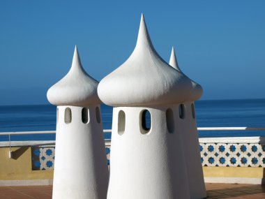 Fairy Chimneys on the terrace overlooking the sea clipart