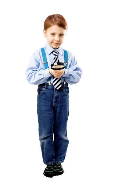 Kleiner Junge mit magnifer — Stockfoto