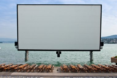 Open-air movie screen on the lake of Zurich clipart