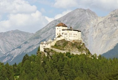 The historical castle Tarasp in the Swiss Alps (Graubunden, Switz clipart