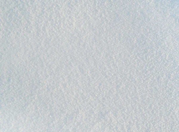 Närbild bild av färsk vit snö. snö bakgrunden — Stockfoto