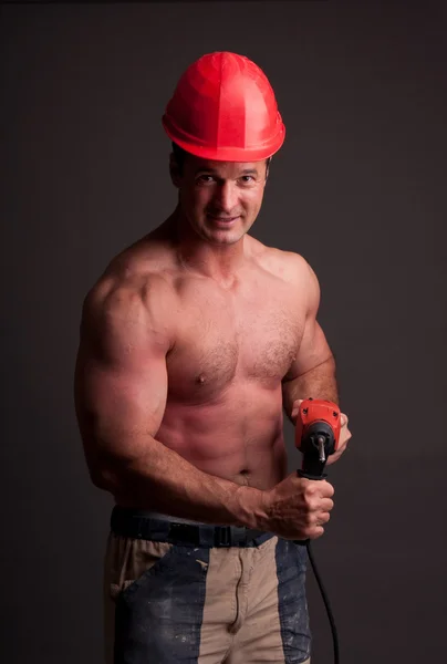 Muskulöser Bauarbeiter — Stockfoto