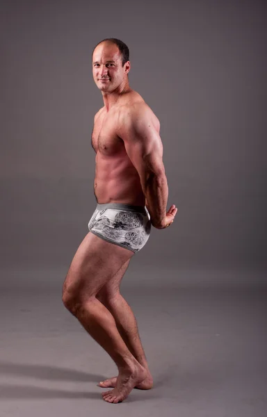 Mature bodybuilder posing — Stock Photo, Image