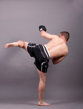 Kick-boxer training before fight clipart