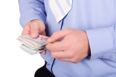 Euro üzerinde beyaz izole bir elinde