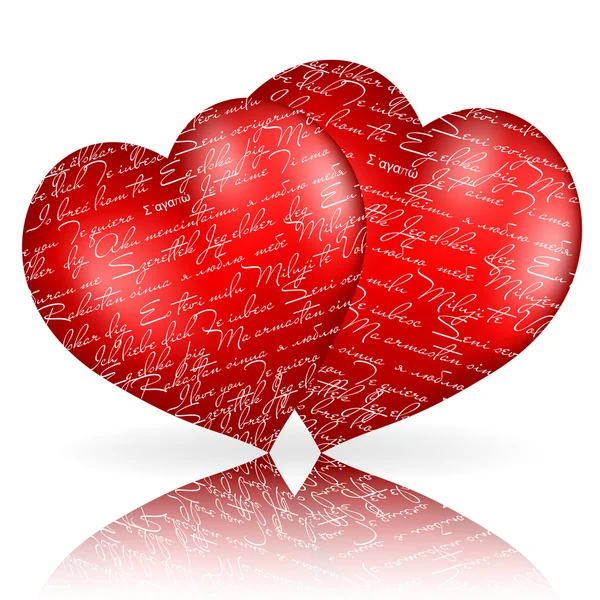 Dois corações vermelhos com "Eu te amo" em línguas diferentes — Vetor de Stock