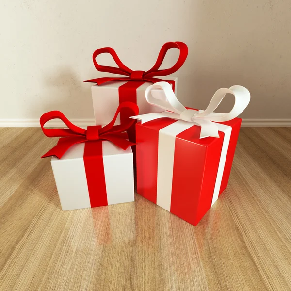 Drei Geschenk auf dem Boden — Stockfoto