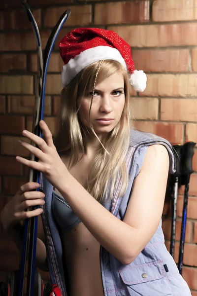 Young sexy blonde with skis. — Stock Photo, Image