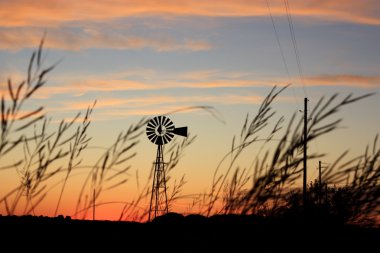 Windmill Sunset with clouds clipart