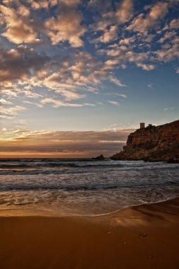 Ghajn Tuffieha Bay is one of the most beautiful and idyllic beaches on the island of Malta,surrounded by unique scenery and within an area of high ecological im clipart