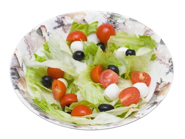 Salát ledový, olivy, tomattos třešeň a sýrem mozzarel — Stock fotografie