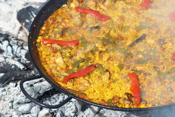 Traditional paella cooking — Stock Photo, Image