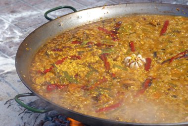 Paella cooking clipart