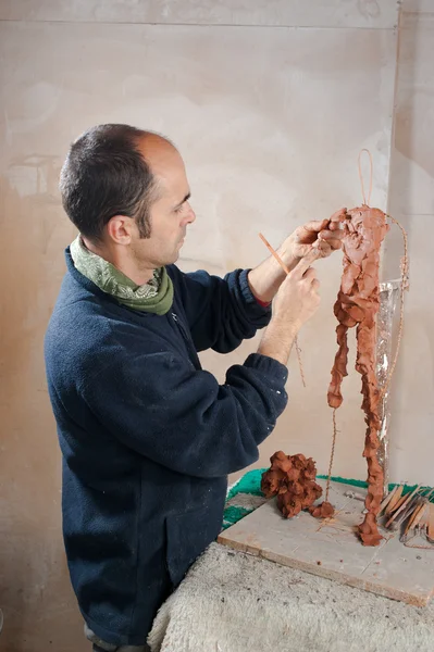 Artist modeling clay — Stock Photo, Image