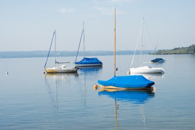 Boats on Calm Lake clipart