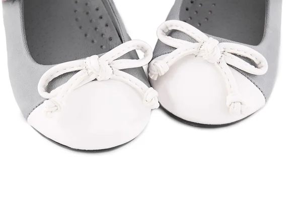 Sapatos de bebê com arcos — Fotografia de Stock