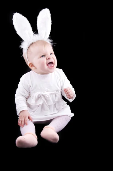Funny baby in bunny costume — Stock Photo, Image