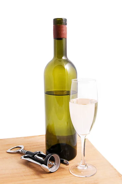 White wine bottle and glass with corkscrew — Stock Photo, Image