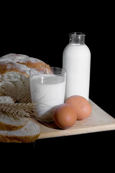 Milk, eggs and bread — Stock Photo, Image